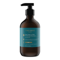 Brown bottle of Theorie Sage Sea Kelp & Mint Purifying Shampoo on a white background